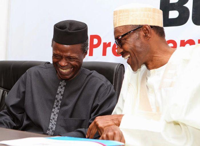 President Buhari enjoying a joke with Vice-President Osinbajo