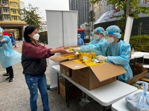 Hong kong distributes anti-epidemic medical supplies from mainland china