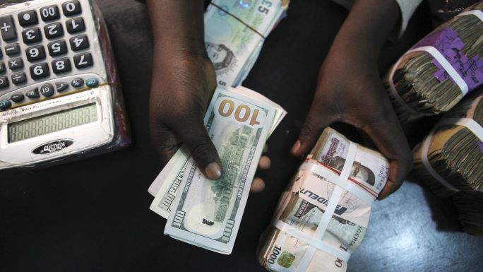 Naira devaluation: Bank customers decry increasing pains, hardship