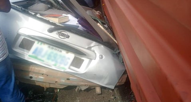 Container falls off, kills woman inside her car in lagos traffic