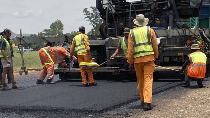 Construction workers decry sack of 30,000 workers, threaten strike 