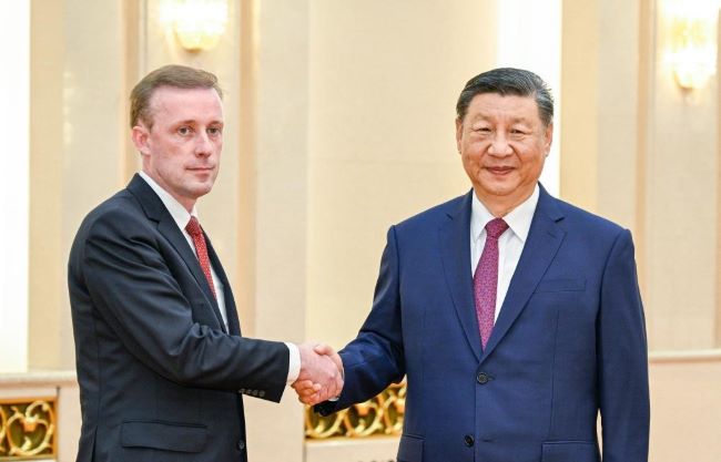 Xi jinping meets u. S. National security advisor